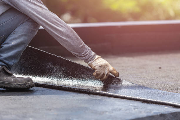Professional Waterproofing technician working in New Era, MI